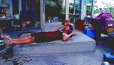 Brunette lady in a black outfit enjoys her outdoor pleasure