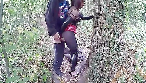 Latex ass babe in the wood with big ass and wet pussy