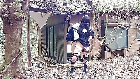 Japanese trans girl peeks herself outdoors in the forest