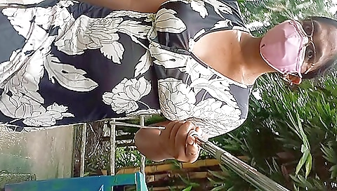 Girl stretches her legs in the outdoor in the park