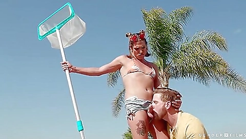 A blonde with a large ass is deepthroated and getting cum on her ass