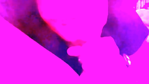 A sexy brunette in a sexy outfit is eating her head